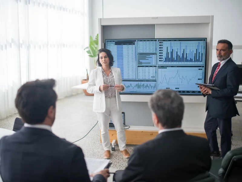 What Is a Proof of Concept? layout with team presenting analytics