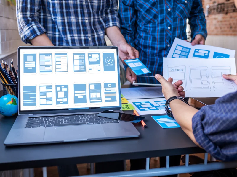 What Is SaaS? layout showing SaaS UI planning on screens